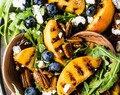 Grilled Peach Salad with Curry Pecans 