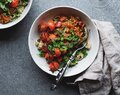 Lentil ragu with bean pasta and baked tomatoes