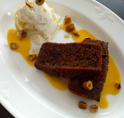 Sticky toffee pudding with butterscotch sauce and vanilla icecream.