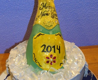 Nytårskage isspand med champagneflaske