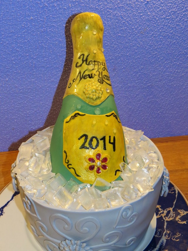 Nytårskage isspand med champagneflaske