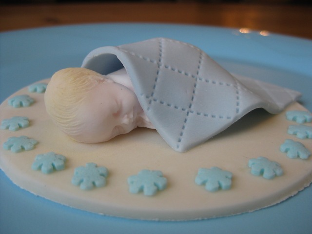 Vauva-koriste rotinakakkuun