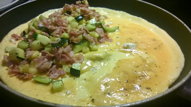Omelettes-Bacon-Feta Cheese-Zucchini Galzone.