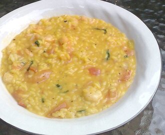 Risotto alla milanese con katkaravut e pomodori