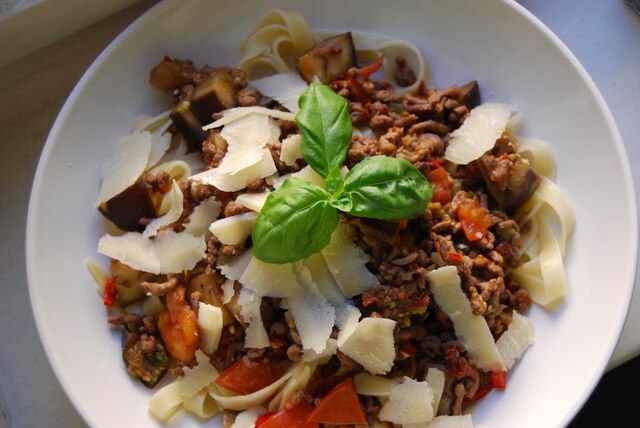 Tagliatelle with eggplant, sundried tomatoes, fresh chili and fromaggi...