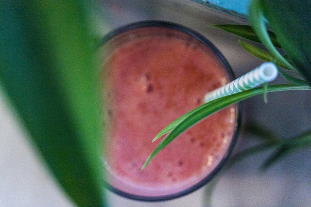 A cup of strawberry smoothie