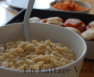 Ost & tomatgratinerad falukorv med stuvade makaroner