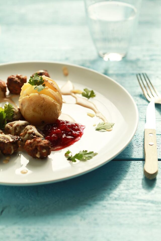 Homemade IKEA food: swedish meatballs with potatoes, brown sauce and lingonberry jam