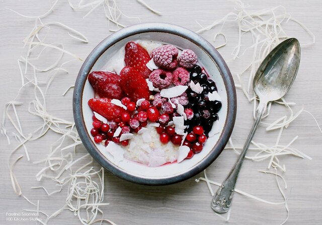 Vegan Coconut Porridge with Berries and Coconut Flakes