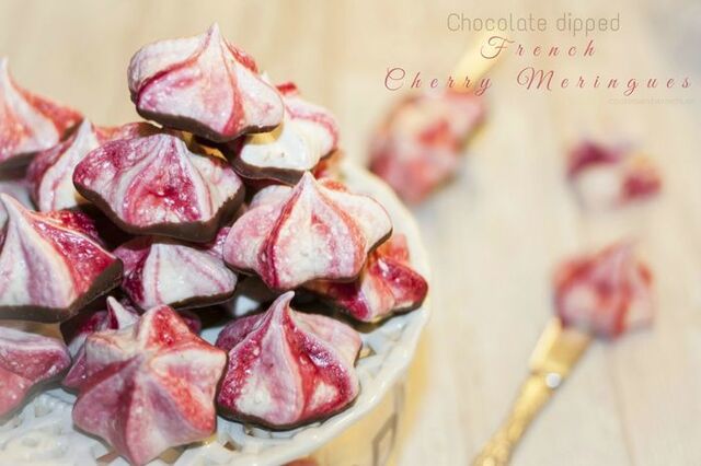 Chocolate dipped french mini meringues