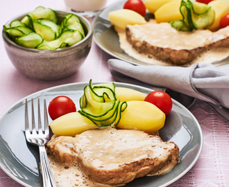 Kotlett med gräddsås och pressgurka