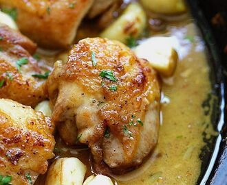 Garlic Chicken with creamy sauce in a cast-iron skillet. | Chicken recipes, Chicken crockpot recipes, Dinner recipes