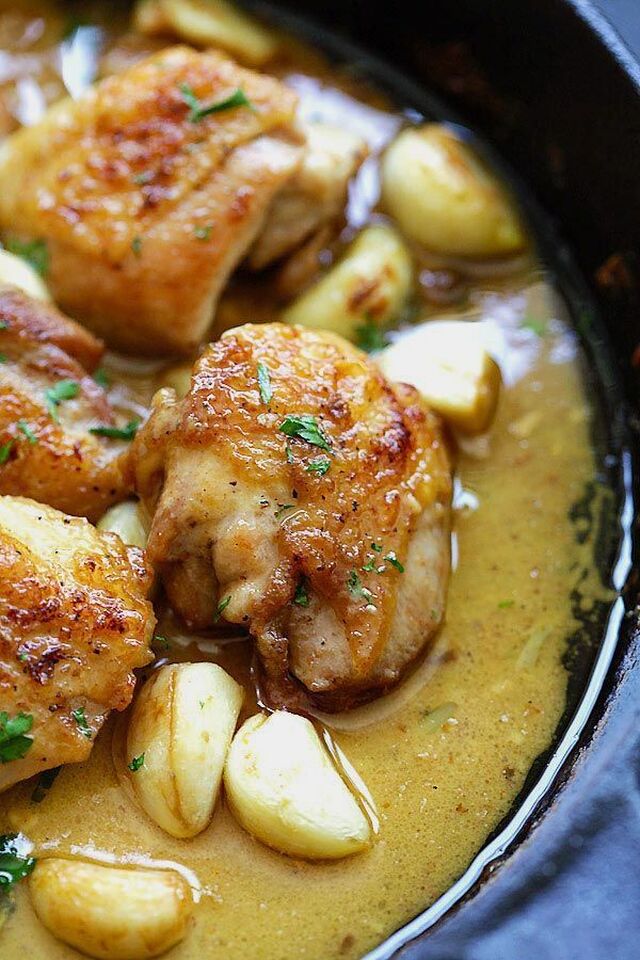 Garlic Chicken with creamy sauce in a cast-iron skillet. | Chicken recipes, Chicken crockpot recipes, Dinner recipes