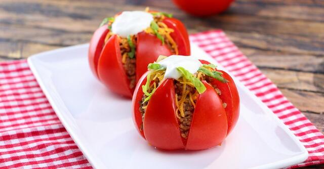Tomatoes stuffed with ground beef and cheese