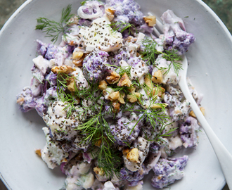 A raw cauliflower salad with horseradish, dill and yoghurt dressing