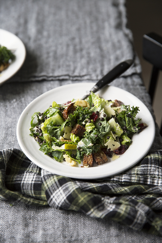 A rustic Caesar salad with tahini dressing, rye bread croutons and Västerbottensost