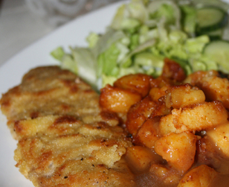 Fläskschnitzel, stekt potatis och brunsås