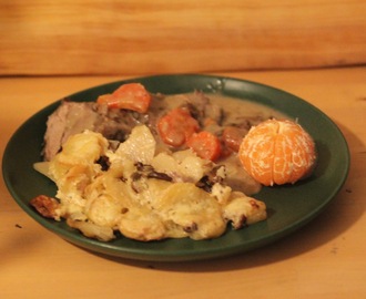 Karré med potatisgratäng och kantarellsås