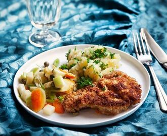 Panerad schnitzel med persiljestompad potatis