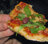 hur länge ska hemmagjord pizza vara i ugnen