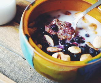 Red quinoa porridge with roasted almonds & blueberries