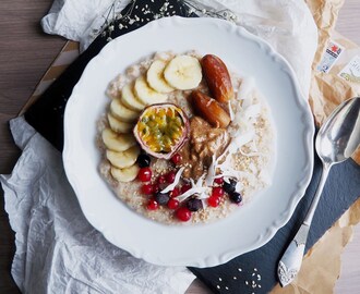 Porridge with Passionfruit, dates, Walnut Butter and Coconut Flakes