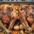 Helstekt kyckling med ört- och vitlökssmör. Rostad färskpotatis, morötter och lök