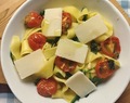 Pasta med ruccola, tomater og parmesan