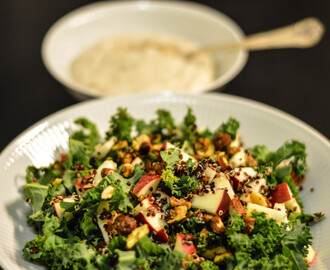 Black quinoa and kale salad with date dressing and spicy nuts