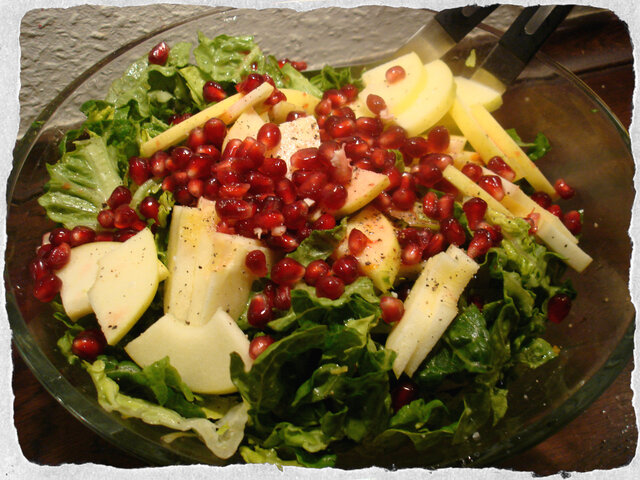 Fresh February salad with apples, pomegranate and citrus dressing