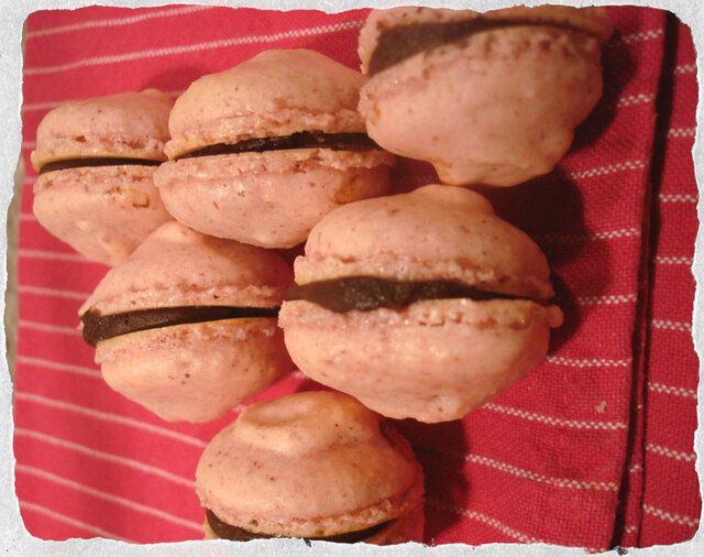 Homemade Raspberry macarons with dark chocolate ganache