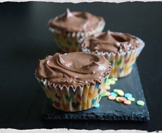 Vanilla cupcakes with cocoa cream cheese frosting