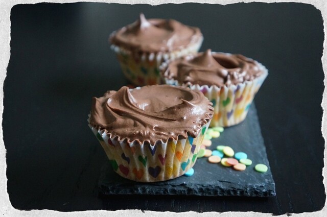 Vanilla cupcakes with cocoa cream cheese frosting