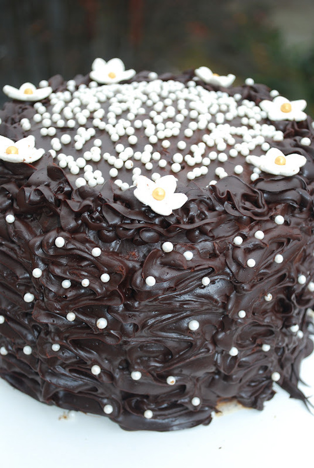 Chocolate frosting vanilla cake.