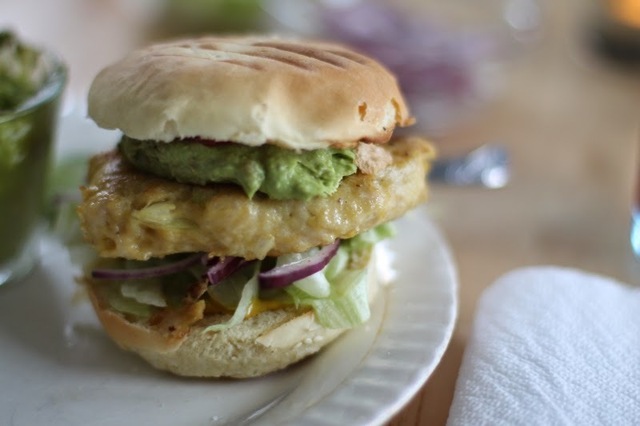 Homemade chickenburger with guaccamole.