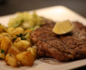 Panerad schnitzel med stekt persiljepotatis